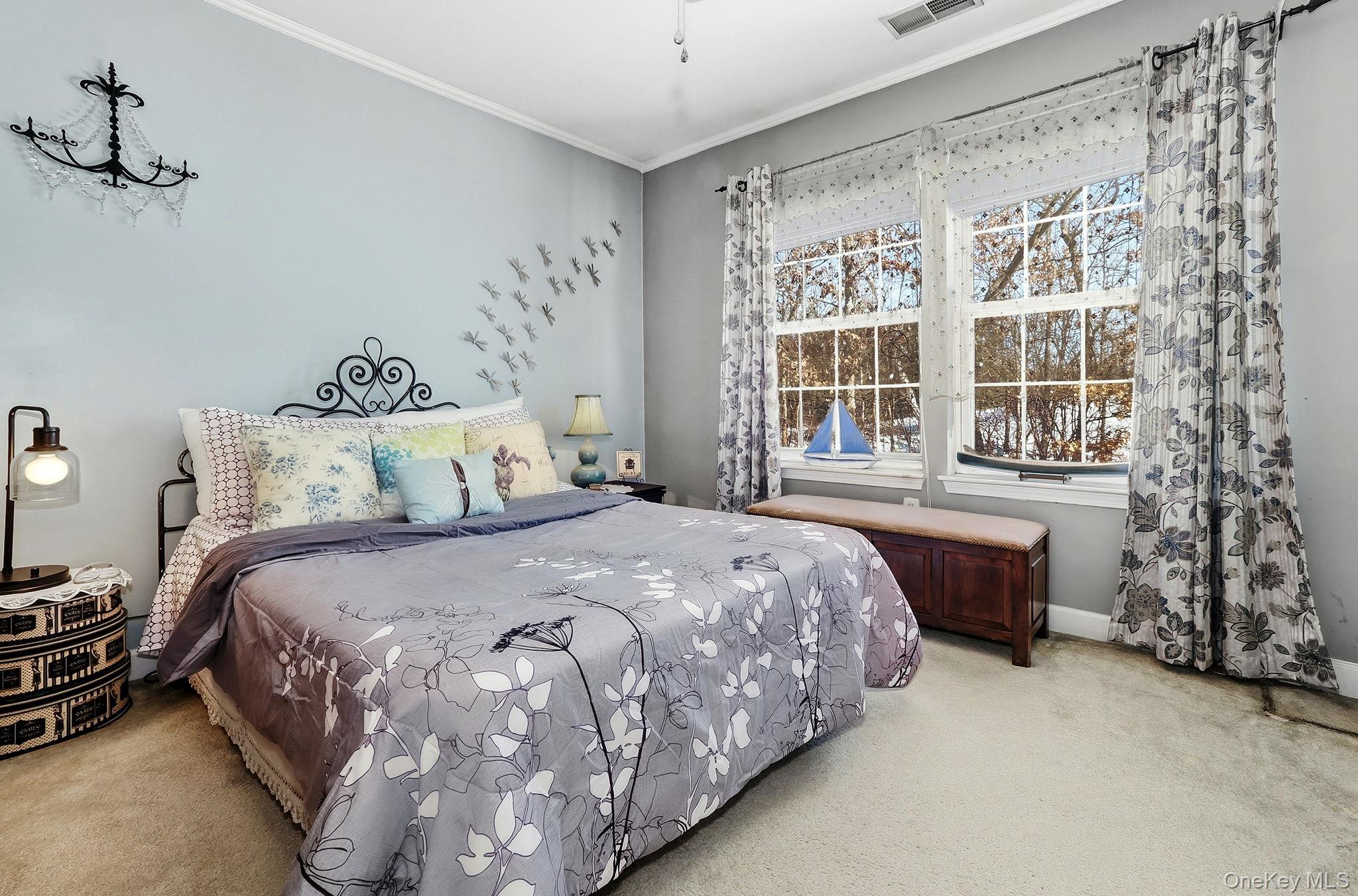 1604 Pondview Loop Wappingers Falls, NY 12590 - Photo 24 of 37 a bedroom with a bed and a window