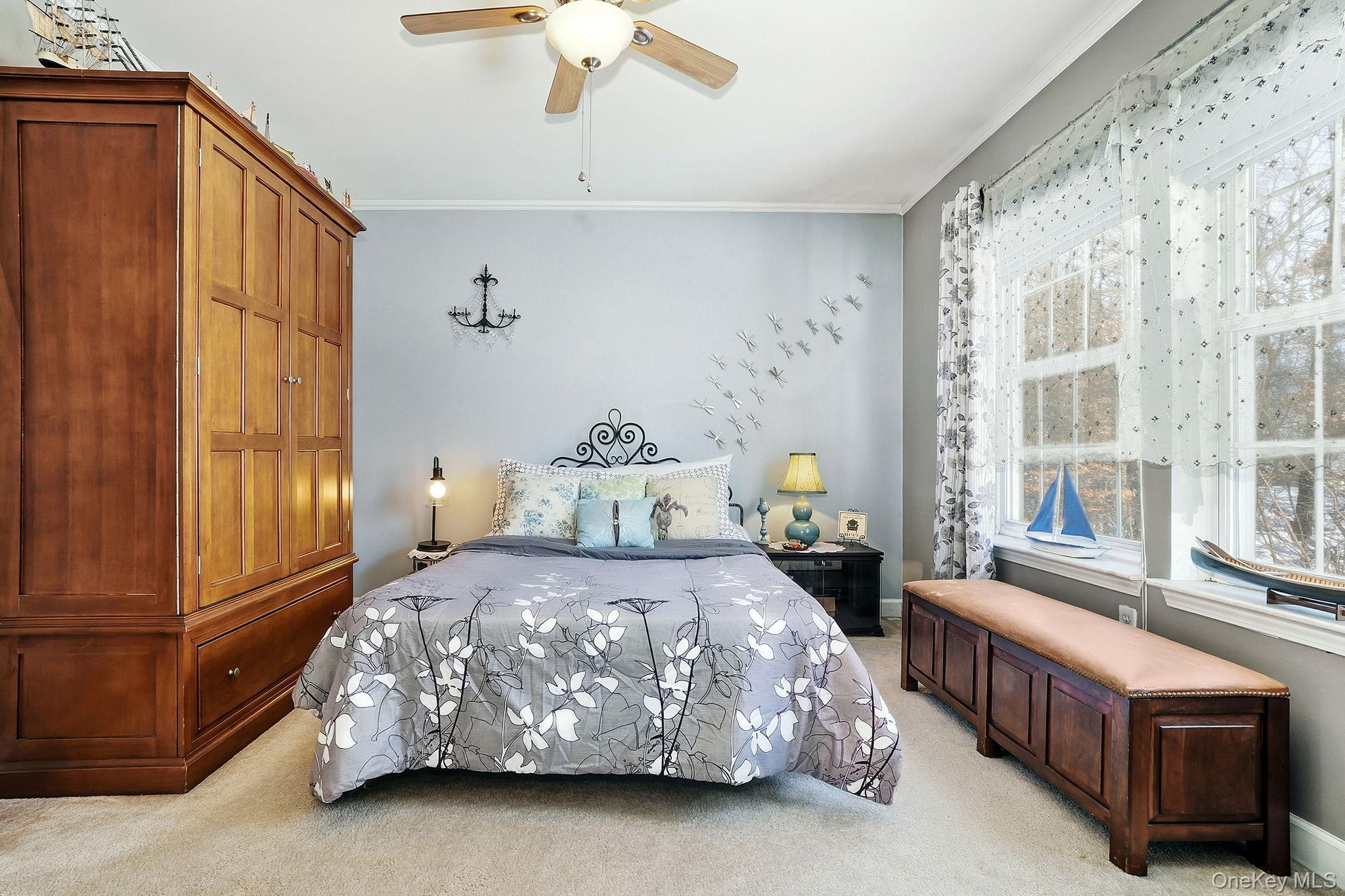 1604 Pondview Loop Wappingers Falls, NY 12590 - Photo 25 of 37 a bedroom with a bed and a window