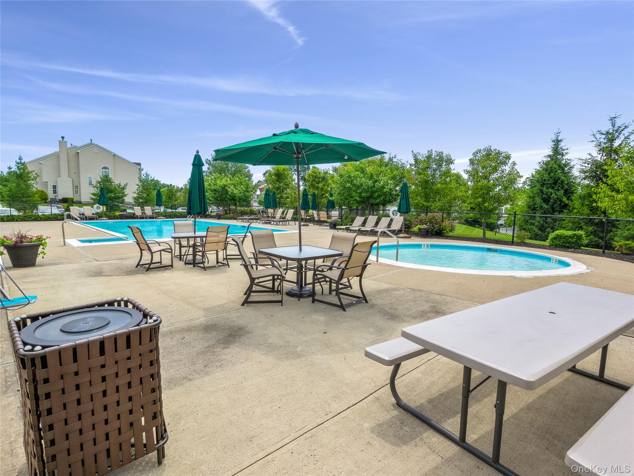 1604 Pondview Loop Wappingers Falls, NY 12590 - Photo 30 of 37 an outdoor space with patio and dining space