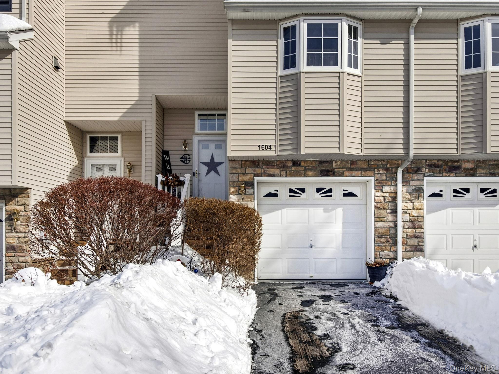 1604 Pondview Loop Wappingers Falls, NY 12590 - Photo 3 of 37 a view of a house with a yard