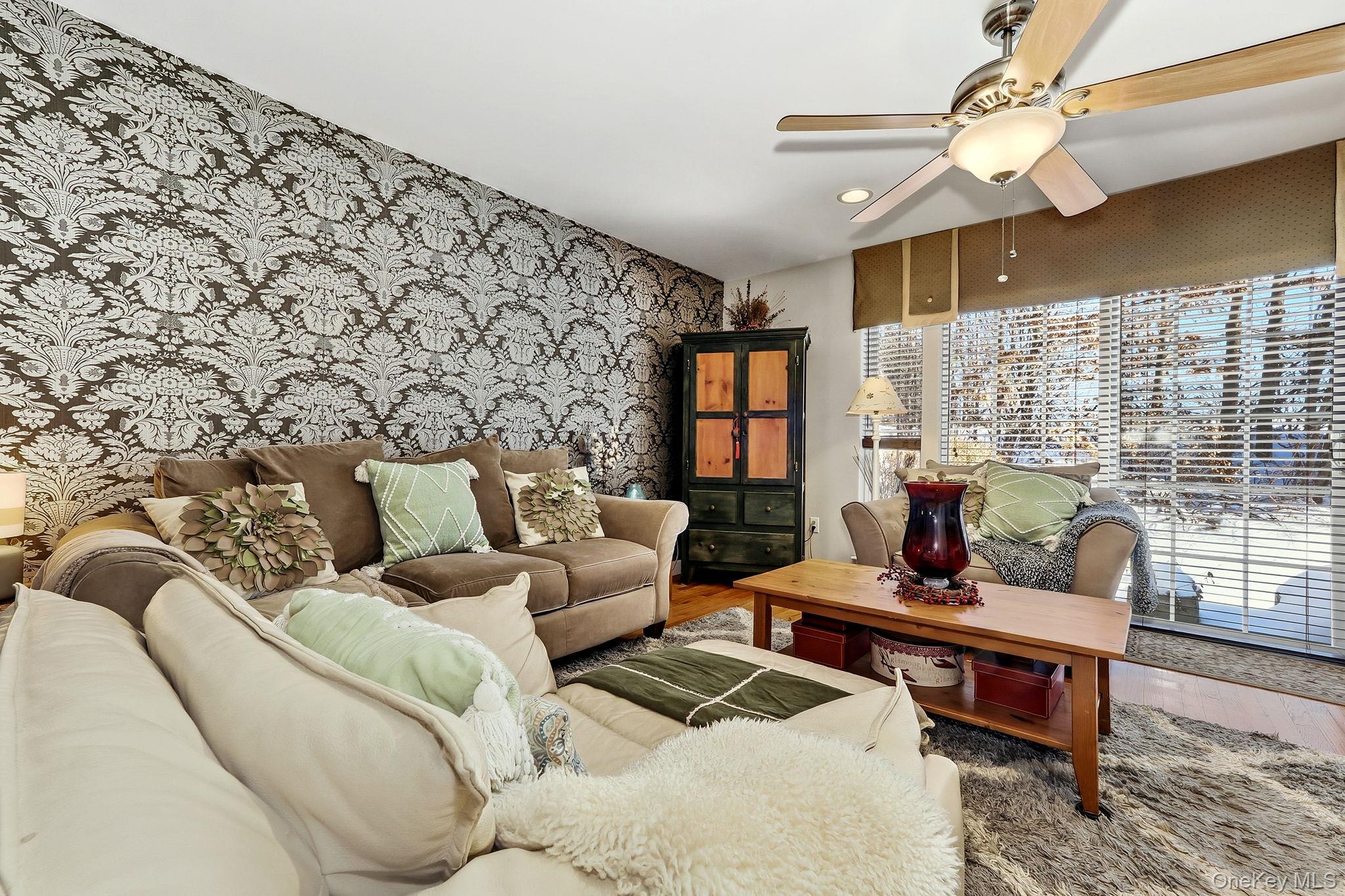 1604 Pondview Loop Wappingers Falls, NY 12590 - Photo 9 of 37 a living room with furniture and wooden floor