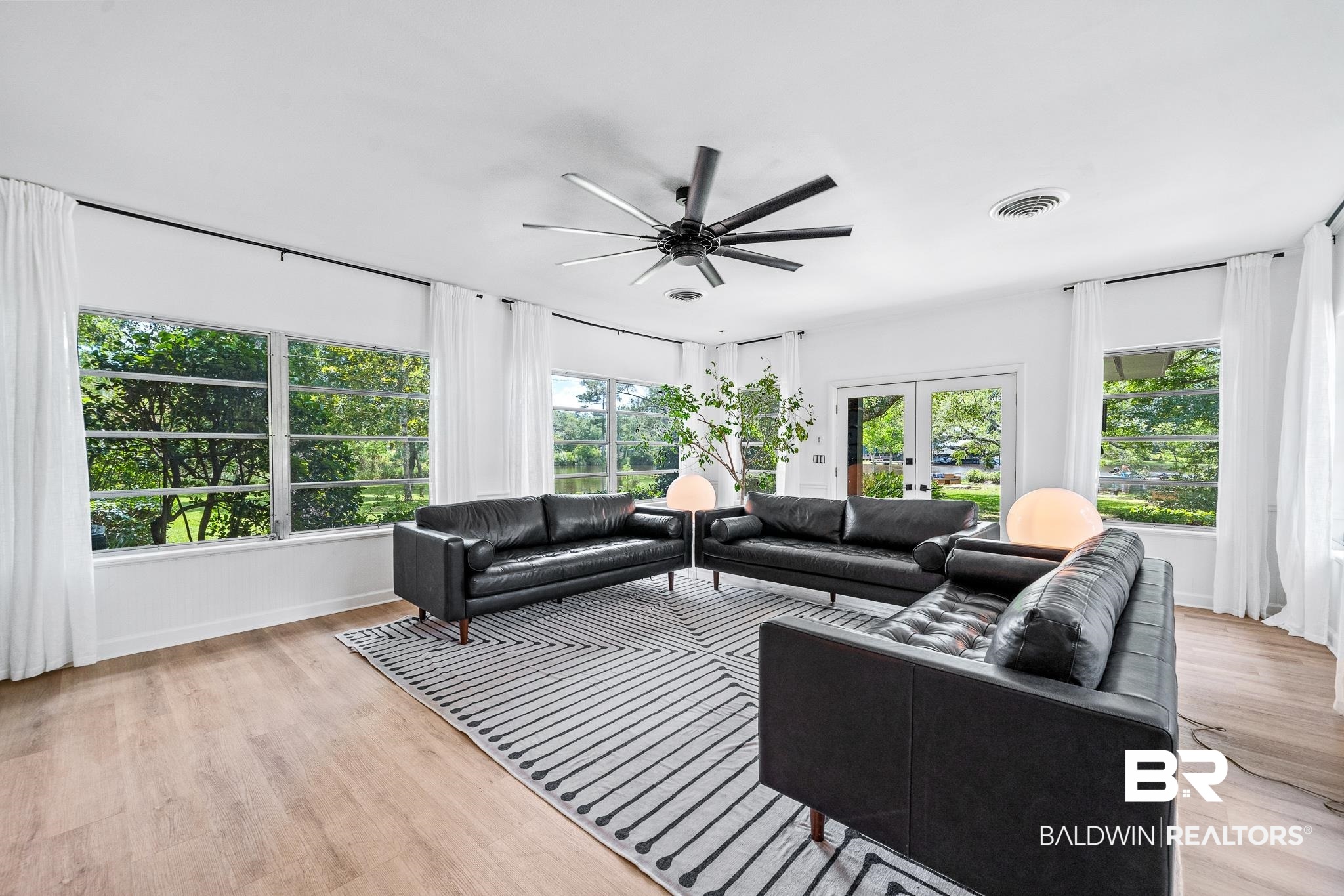 18513 Yacht Club Road Foley, AL 36535 - Photo 13 of 53 Living room with french doors, light wood-type flooring, and ceiling fan