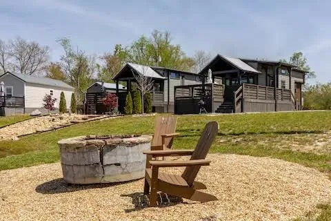 a view of a backyard with furniture