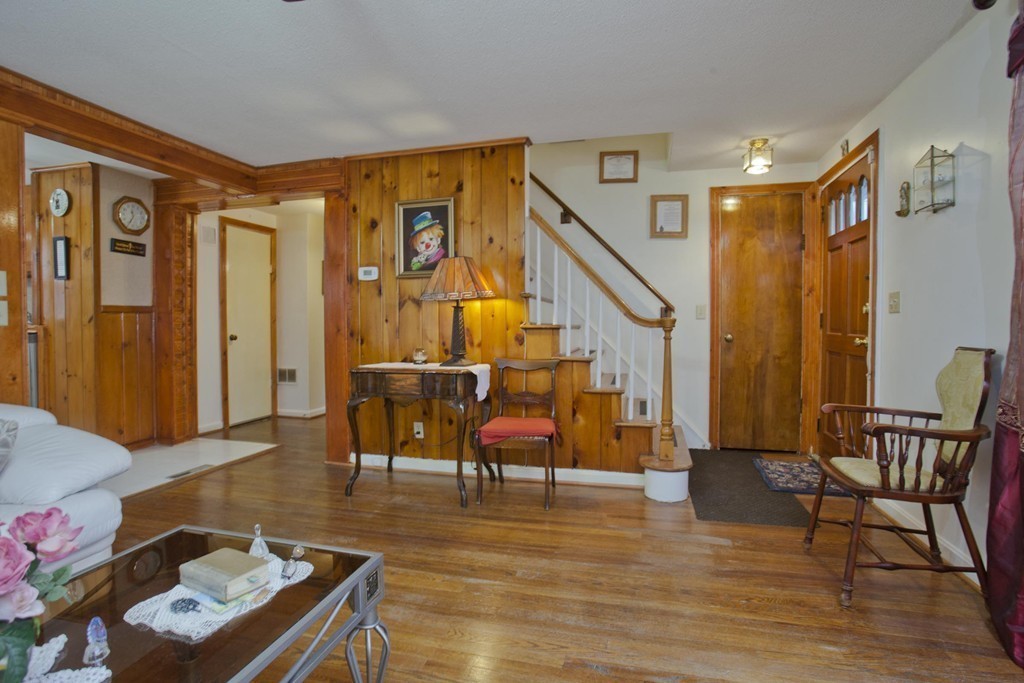 267 Shawmut Street Springfield, MA 01108 - Photo 13 of 30 a living room with furniture and wooden floor