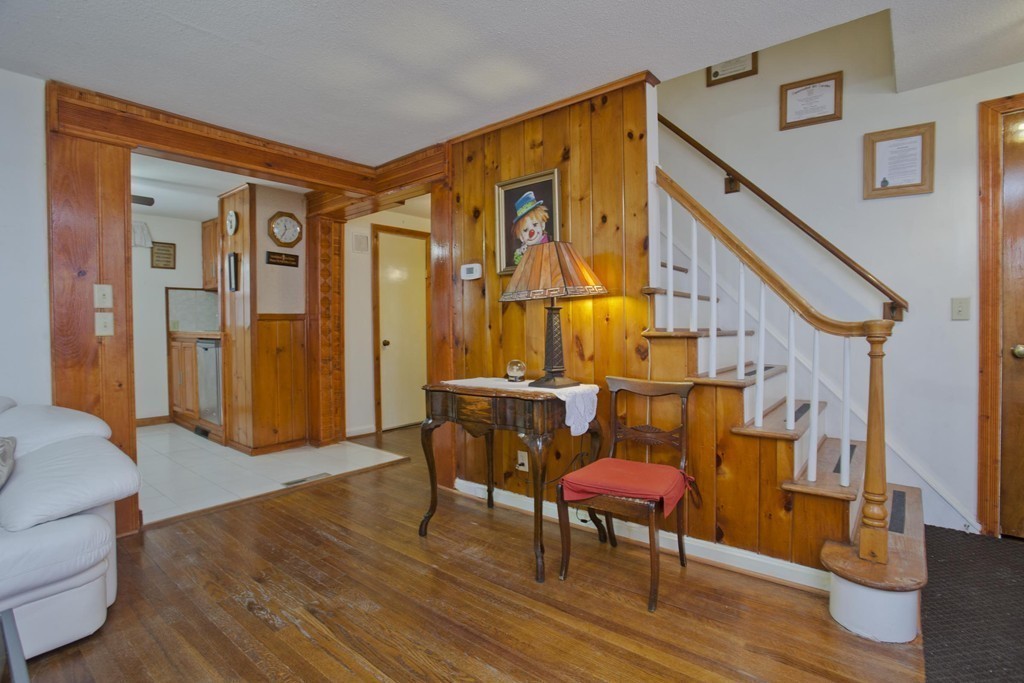 267 Shawmut Street Springfield, MA 01108 - Photo 14 of 30 a view of entryway dining room and hall with wooden floor