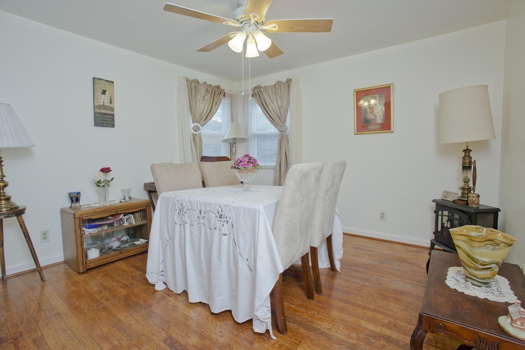 267 Shawmut Street Springfield, MA 01108 - Photo 17 of 30 a bedroom with furniture and a wooden floor