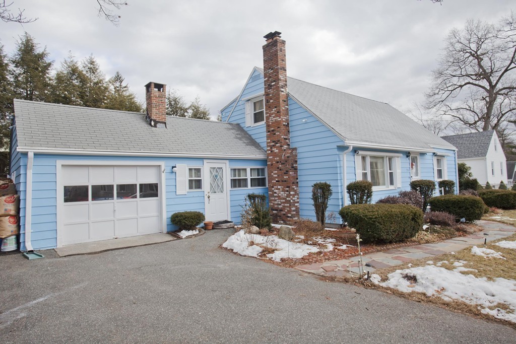 267 Shawmut Street Springfield, MA 01108 - Photo 2 of 30 a front view of a house with a yard