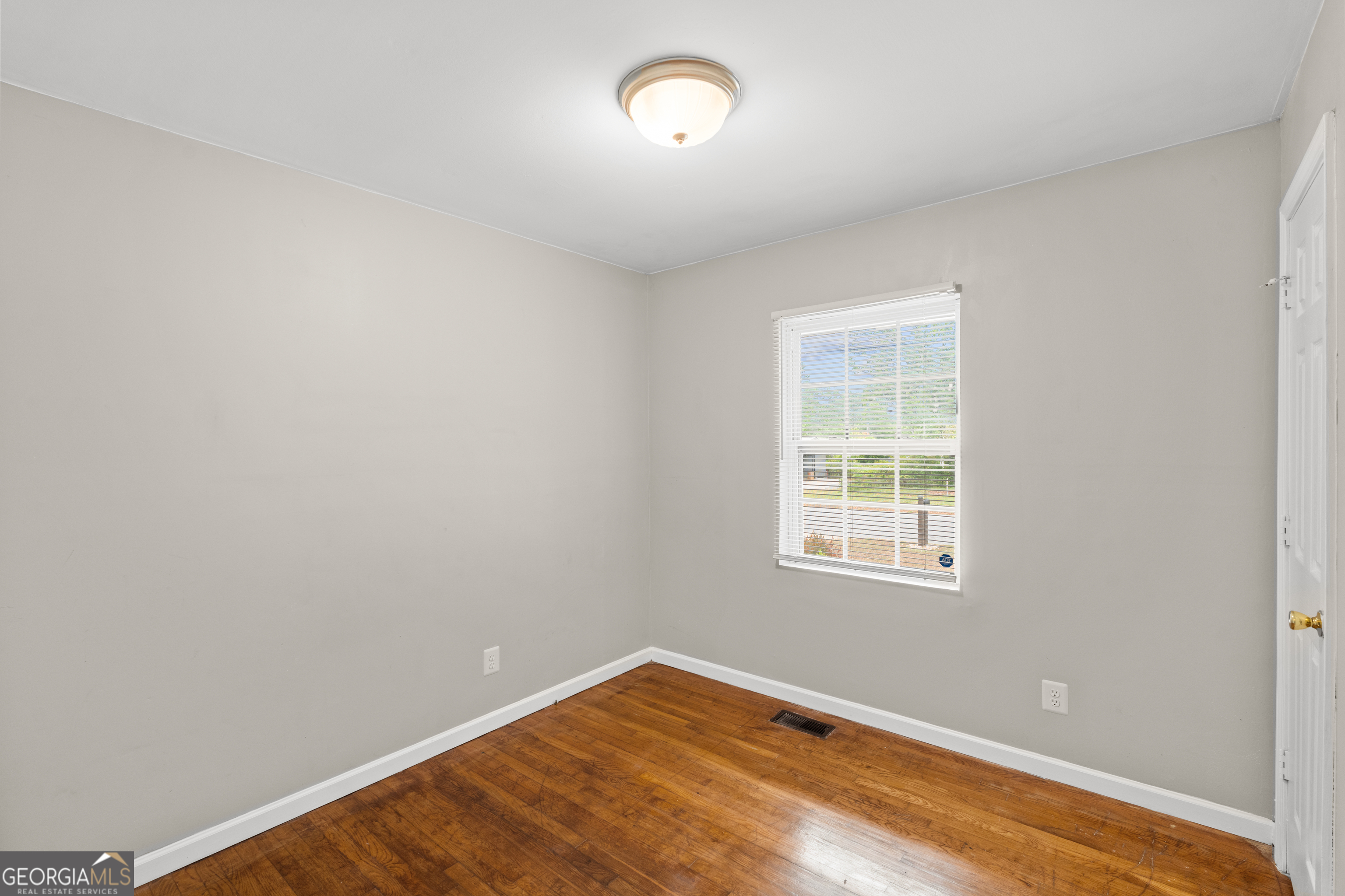 2161 Rochelle Way South Fulton, GA 30349 - Photo 12 of 20 an empty room with a window