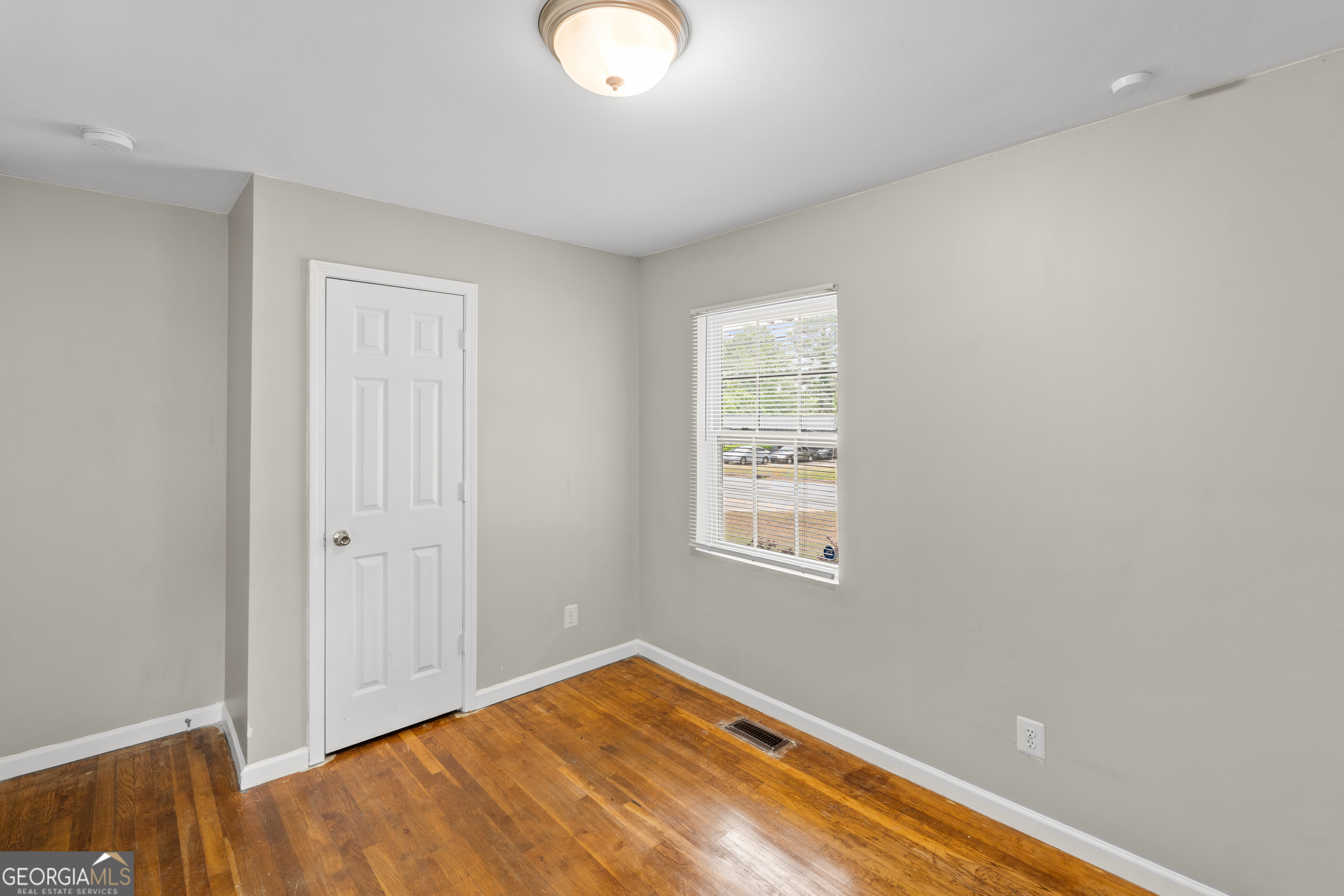 2161 Rochelle Way South Fulton, GA 30349 - Photo 13 of 20 an empty room with windows