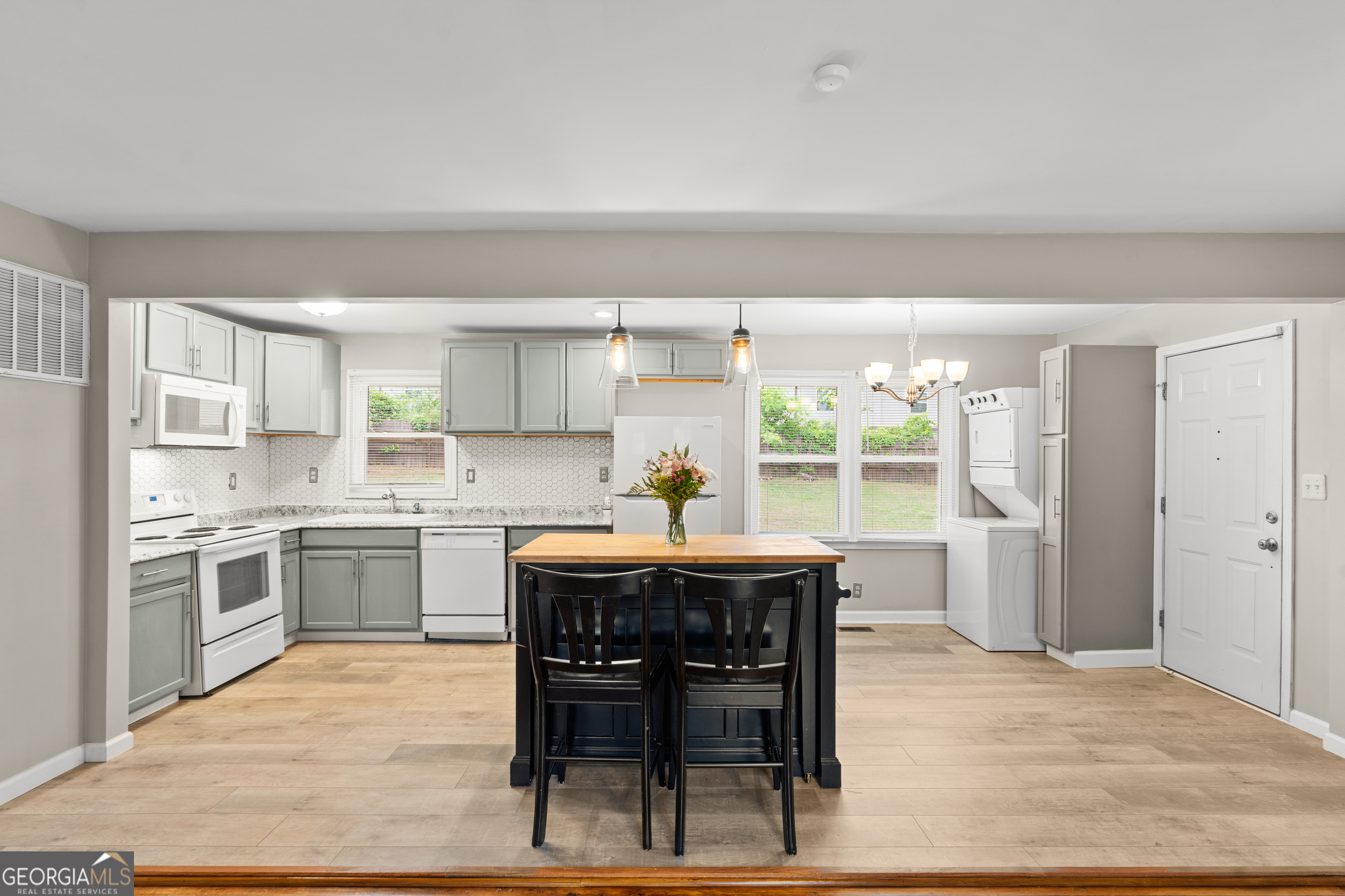 2161 Rochelle Way South Fulton, GA 30349 - Photo 10 of 20 a kitchen with a table and chairs in it