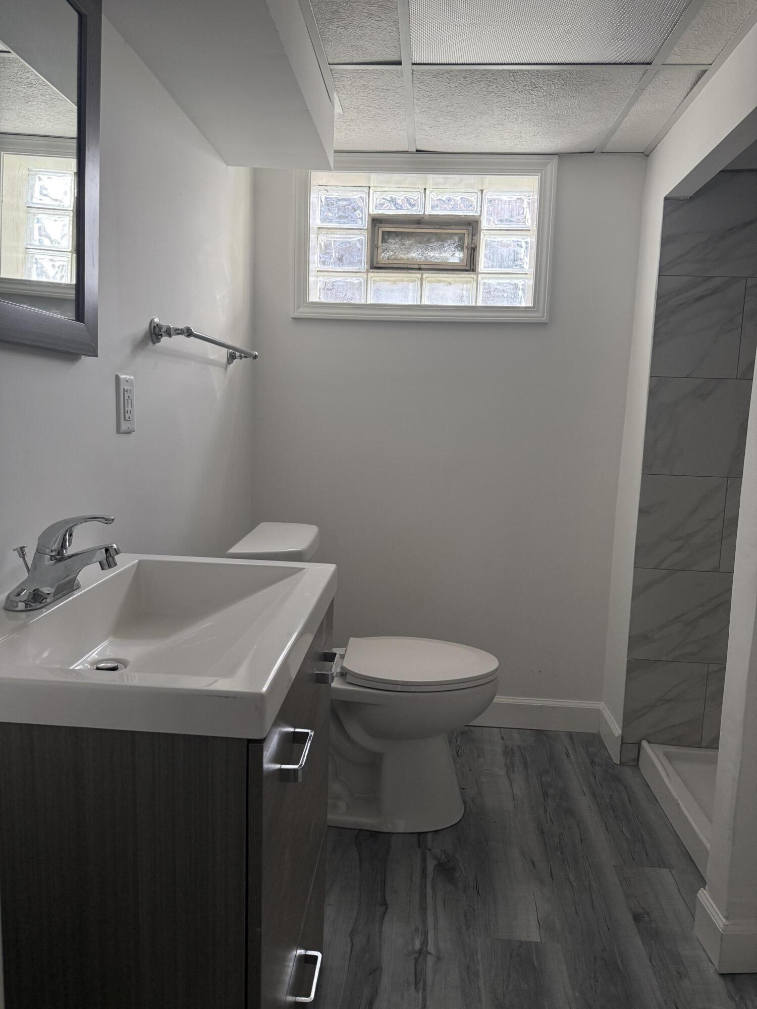 541 Chase Street Gary, IN 46404 - Photo 10 of 13 a bathroom with a sink and a toilet