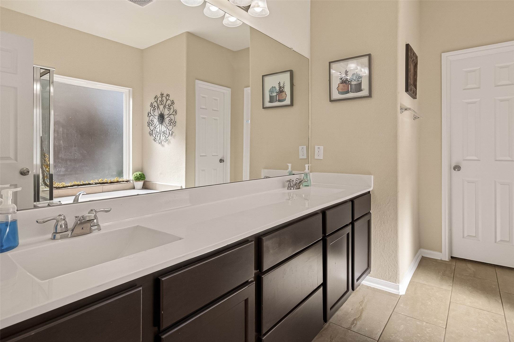 4508 Coopers Hl Trail Rosenberg, TX 77471 - Photo 36 of 43 a bathroom with a sink double vanity and a mirror