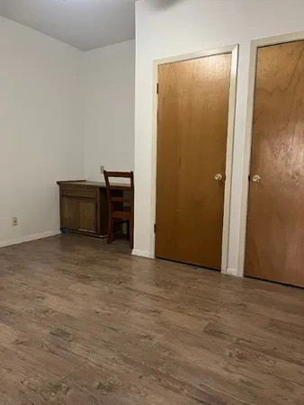 a view of a room with an empty space