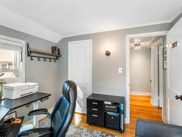 a workspace with furniture and a desk