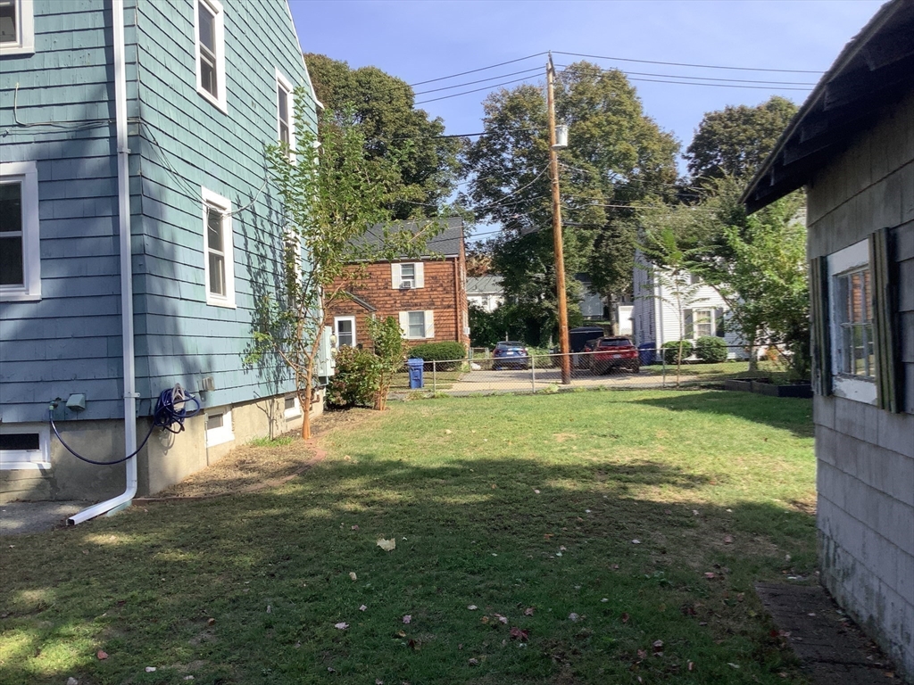 22 Jefferson Road, Unit 22 Wakefield, MA 01880 - Photo 19 of 22 a view of a fountain in front of a house