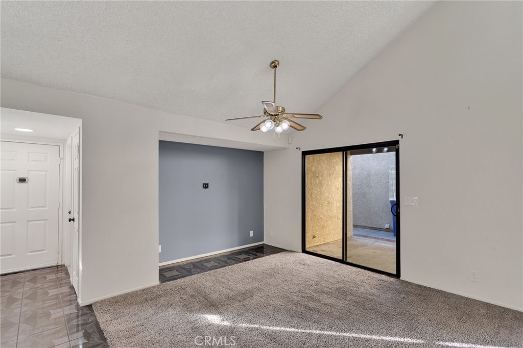 11659 Pepper Lane Apple Valley, CA 92308 - Photo 15 of 50 a view of an empty room with chandelier fan