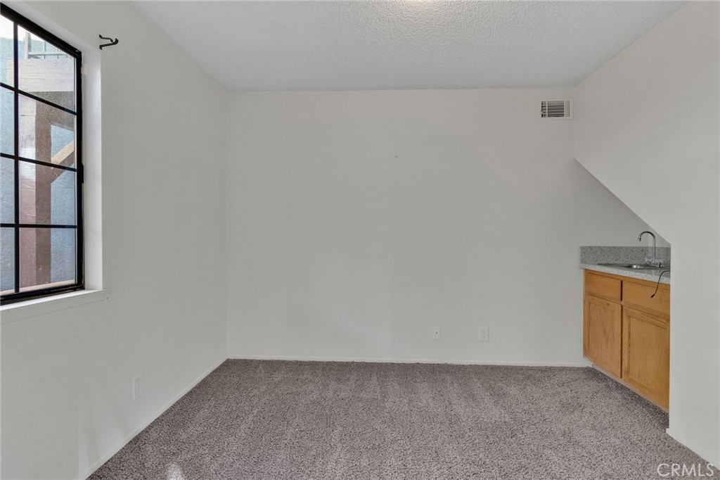11659 Pepper Lane Apple Valley, CA 92308 - Photo 17 of 50 a view of an empty room
