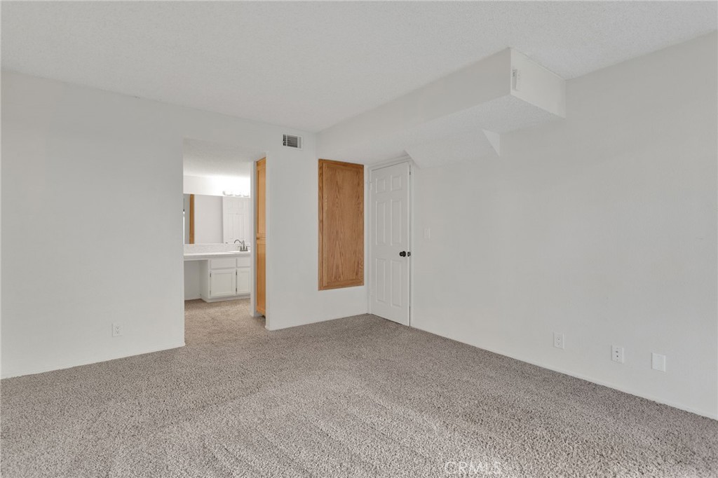 11659 Pepper Lane Apple Valley, CA 92308 - Photo 22 of 50 a view of an empty room