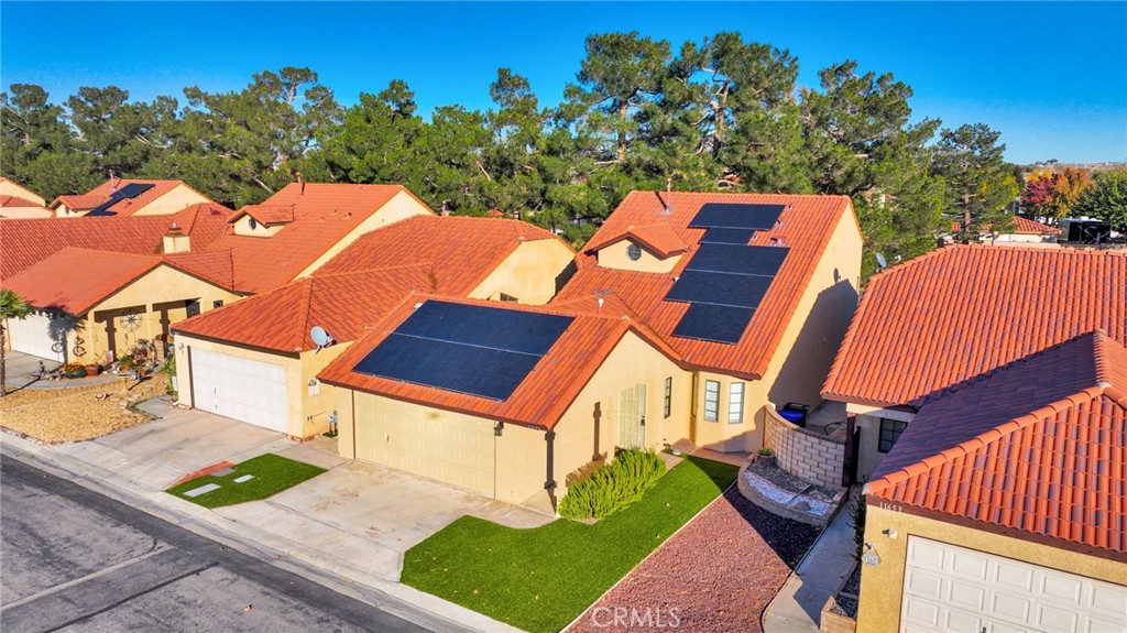 11659 Pepper Lane Apple Valley, CA 92308 - Photo 44 of 50 an aerial view of a house with swimming pool and sitting area