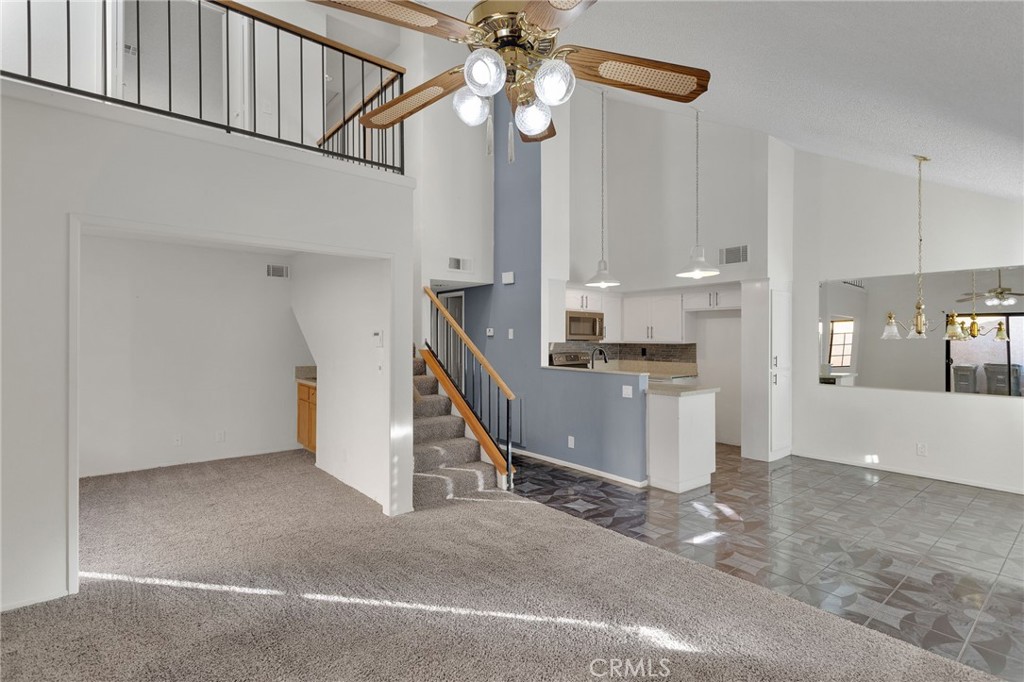 11659 Pepper Lane Apple Valley, CA 92308 - Photo 9 of 50 a view of an empty room and kitchen view