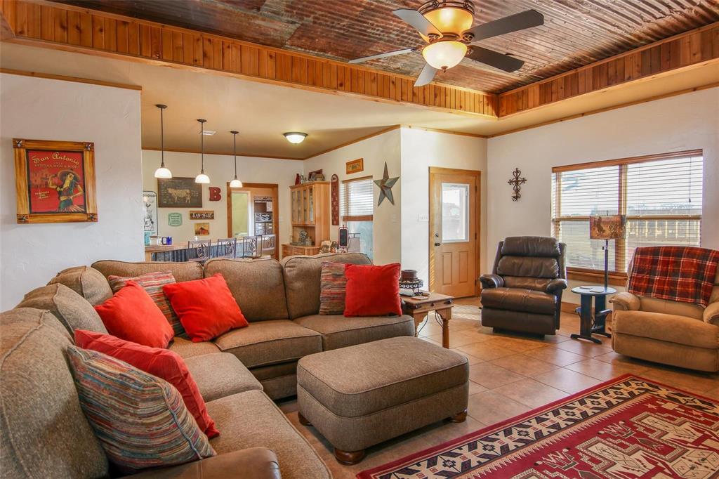 7158 Luella Road Sherman, TX 75090 - Photo 9 of 40 a living room with furniture and a large window