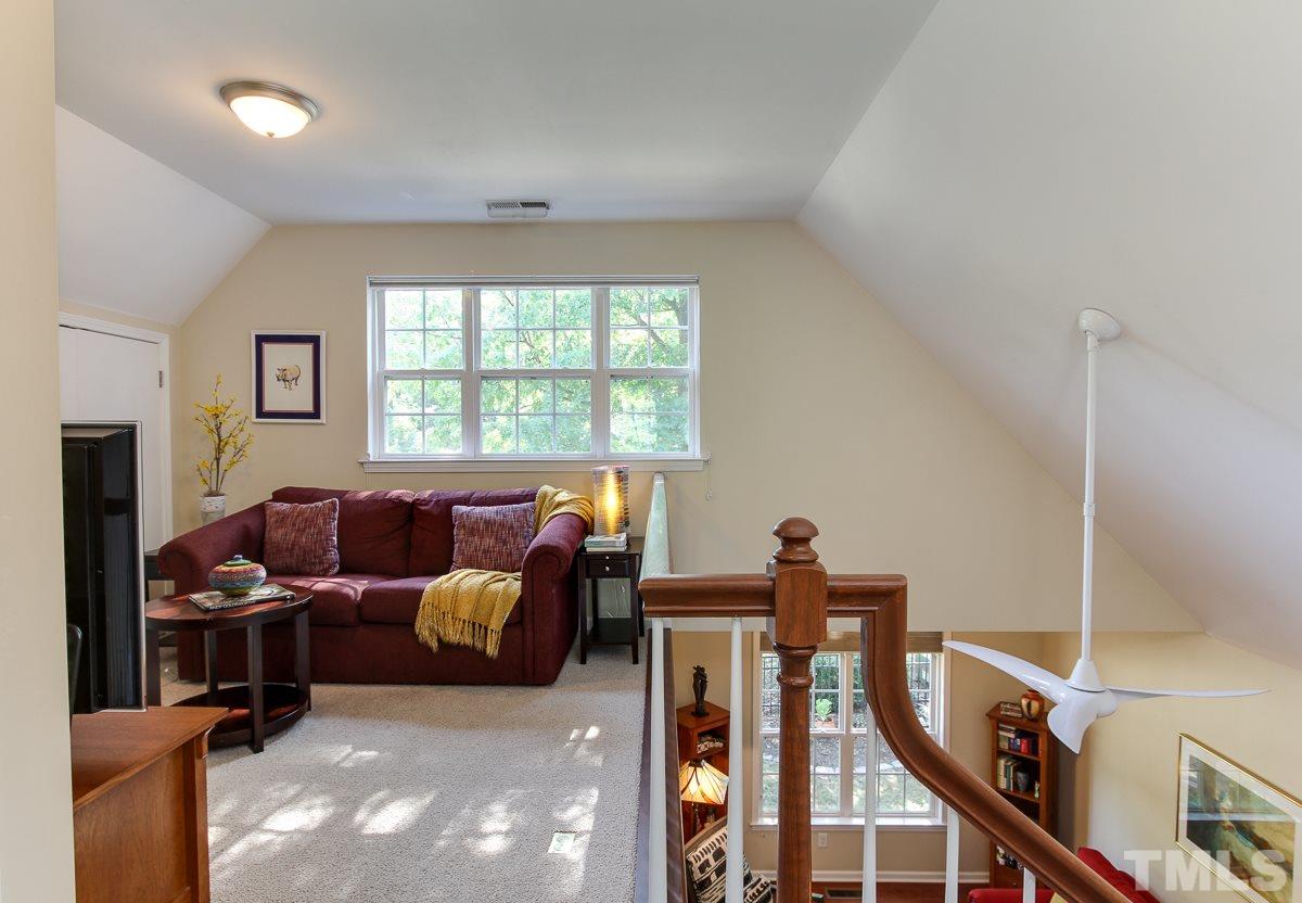 225 Cooke Street Raleigh, NC 27601 - Photo 13 of 24 a view of a livingroom with furniture and a window