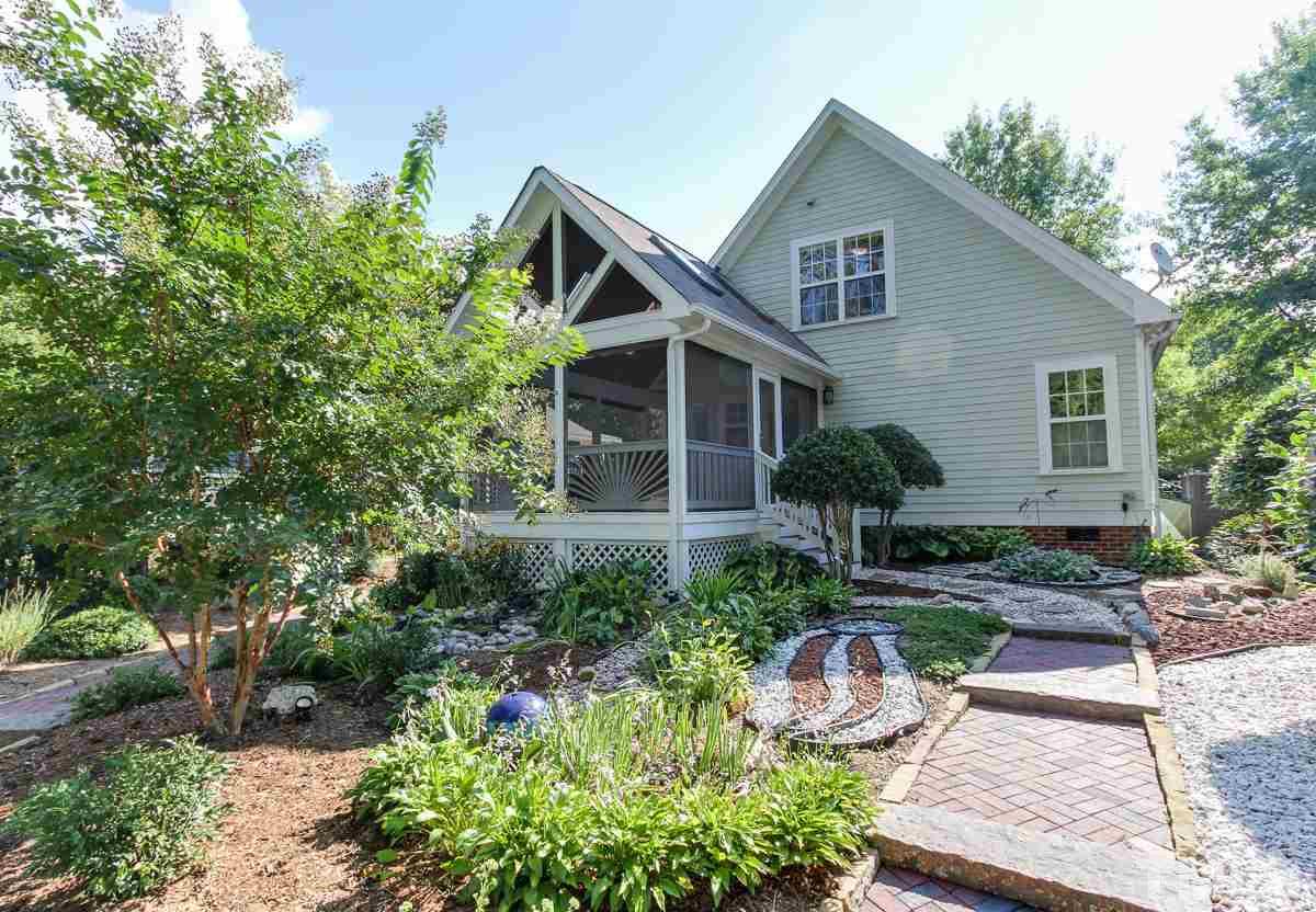 225 Cooke Street Raleigh, NC 27601 - Photo 20 of 24 a front view of a house with garden
