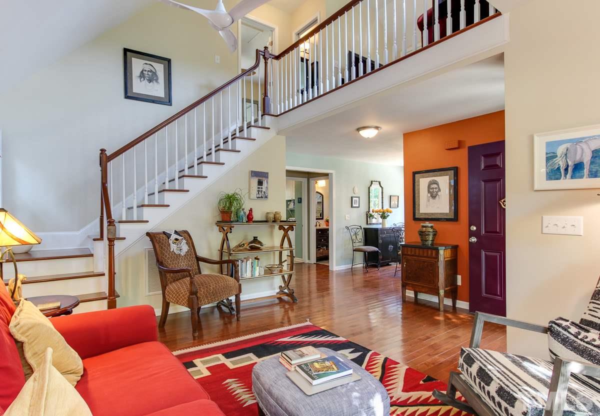 225 Cooke Street Raleigh, NC 27601 - Photo 4 of 24 a living room with furniture and wooden floor