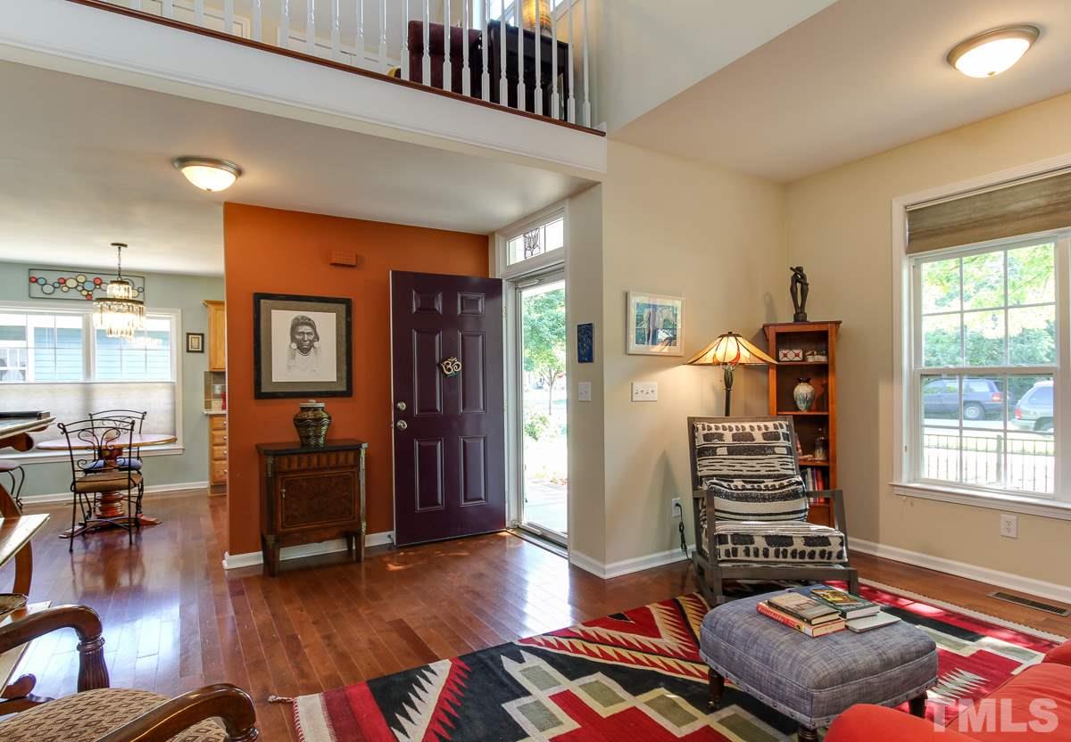 225 Cooke Street Raleigh, NC 27601 - Photo 5 of 24 a living room with furniture and a window