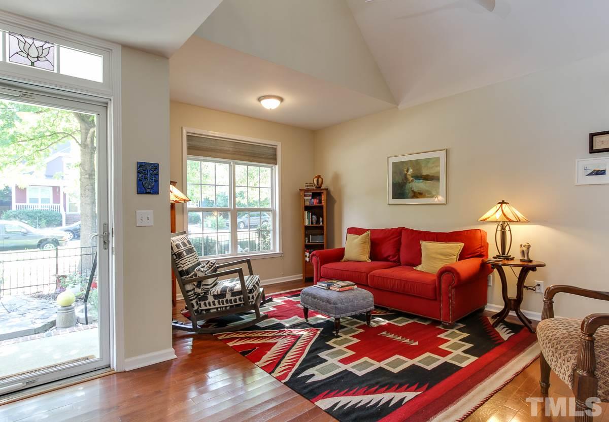 225 Cooke Street Raleigh, NC 27601 - Photo 6 of 24 a living room with furniture and a window