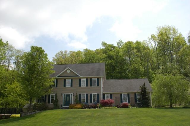 6 Nancy Lane Brookfield, CT 06804 - Photo 1 of 1 front view of a house with a yard