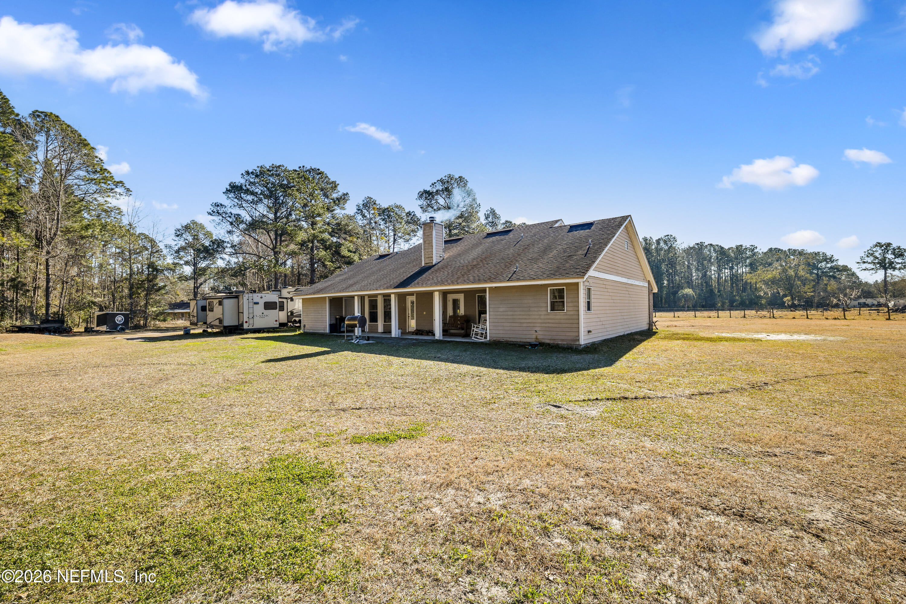 1725 Davidson Farm Road Jacksonville, FL 32218 - Photo 47 of 53 a front view of a house with a yard