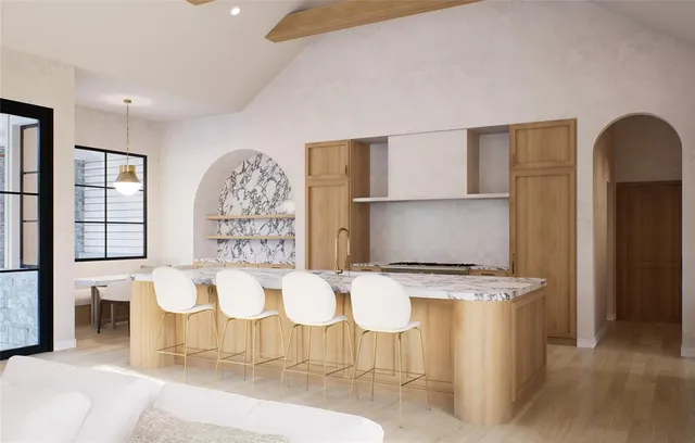 a kitchen with a white cabinets and stove