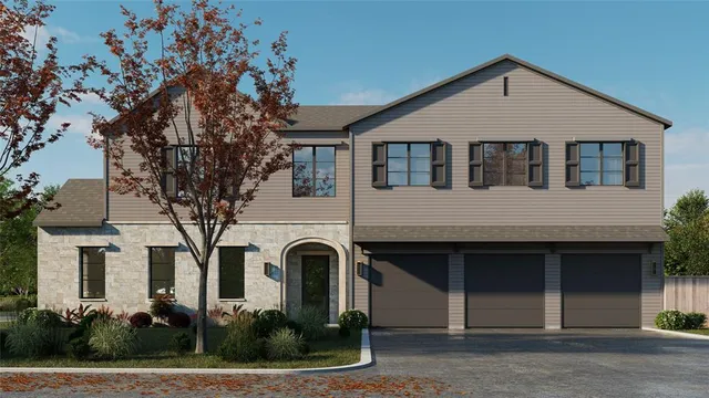 a front view of a house with plants and trees
