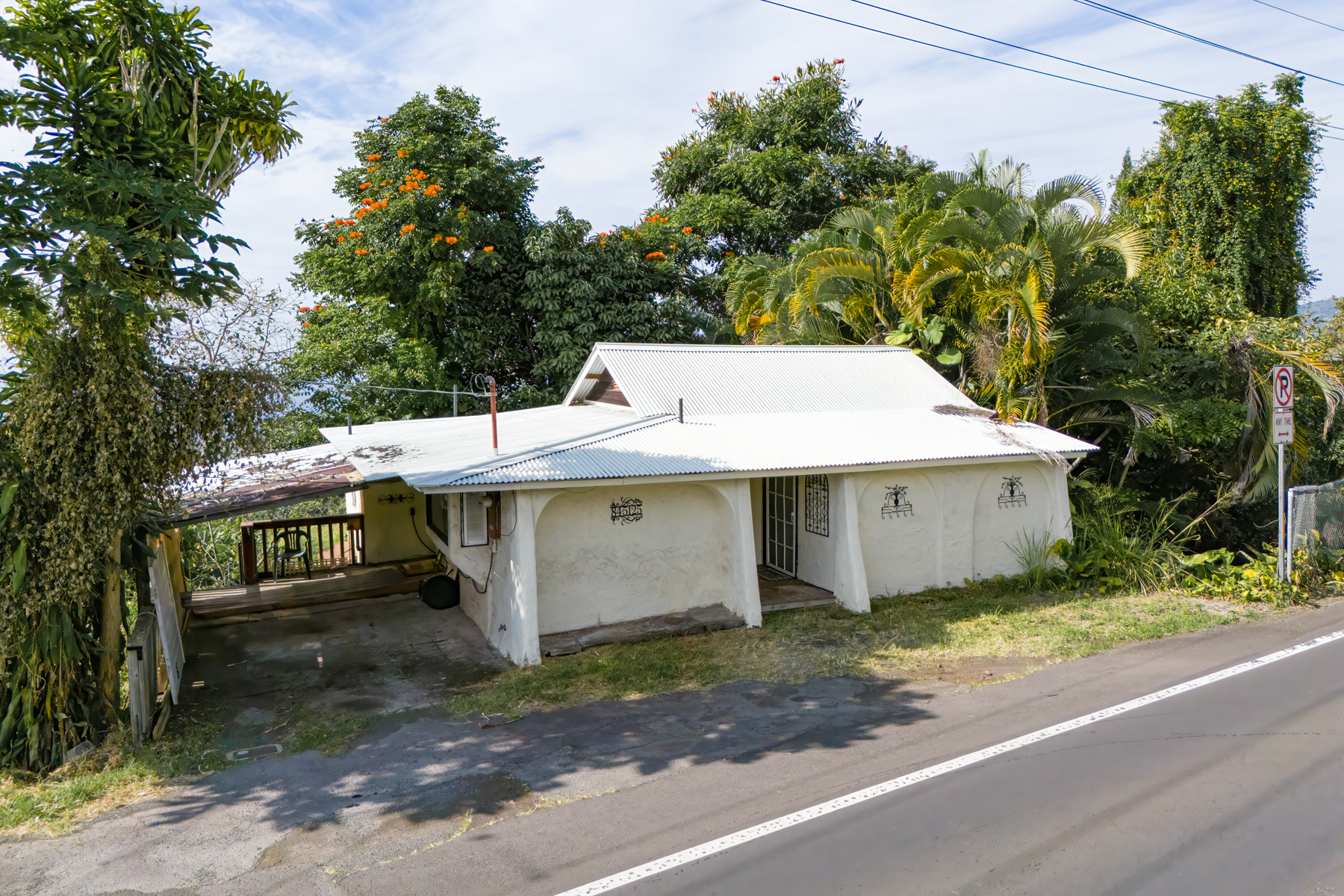 a view of a house with a yard and garage