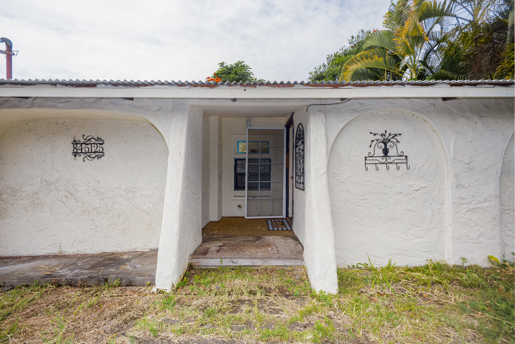 84-5125 Hawaiʻi Belt Road Captain Cook, HI 96704 - Photo 2 of 27 a house with a outdoor space