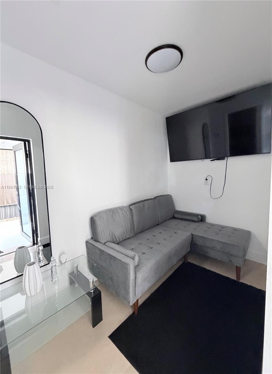 13261 Southwest 260th Terrace Homestead, FL 33032 - Photo 18 of 36 a living room with furniture