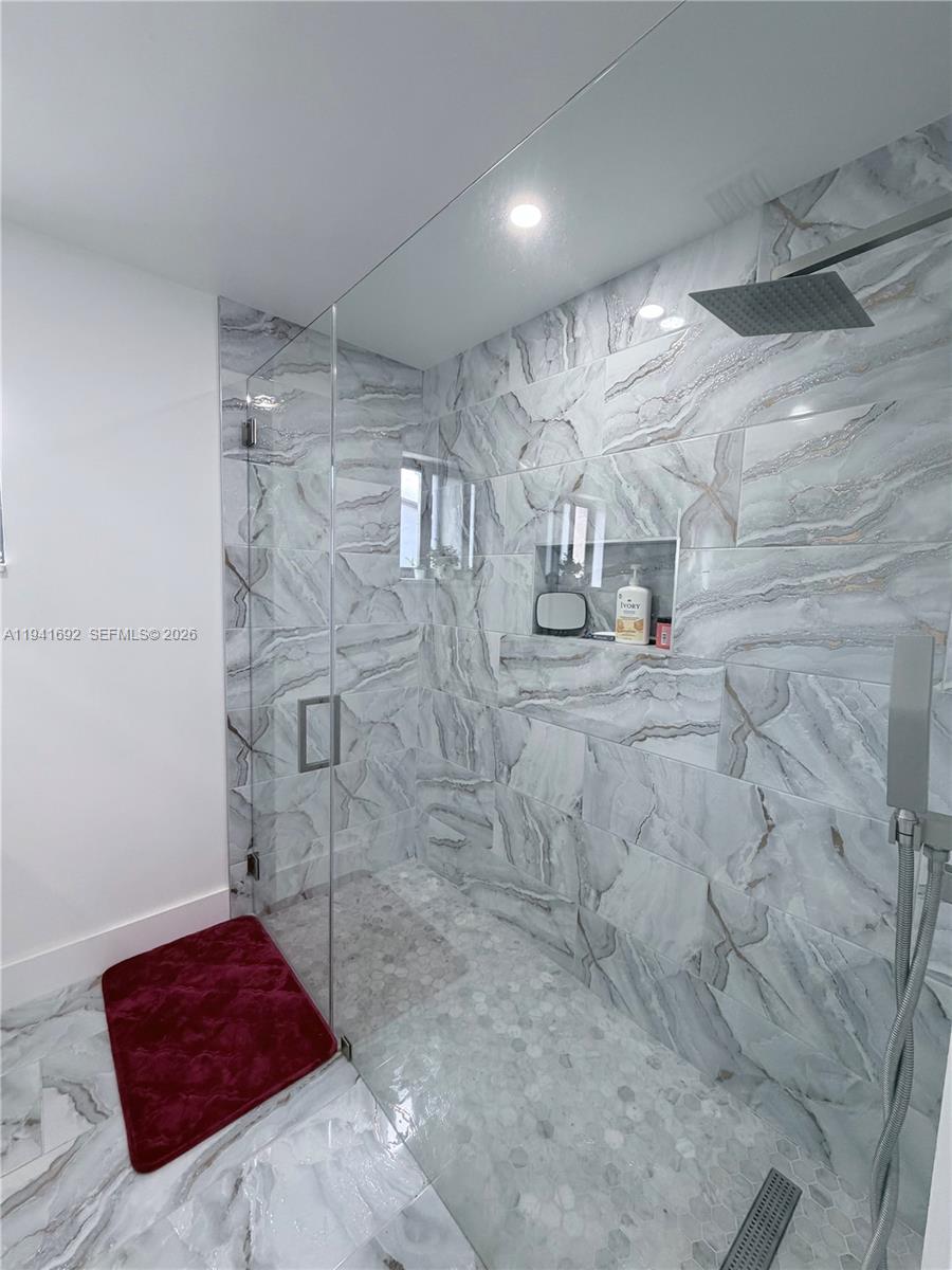 13261 Southwest 260th Terrace Homestead, FL 33032 - Photo 35 of 36 a bathroom with a shower