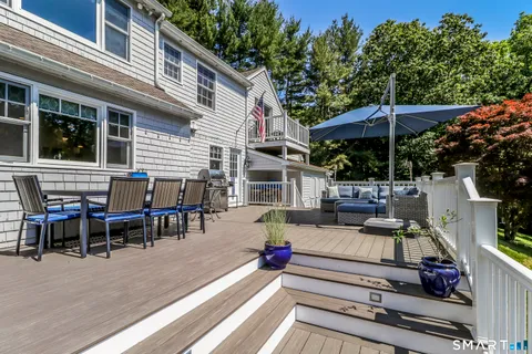 a view of a tables and chairs in patio of the house