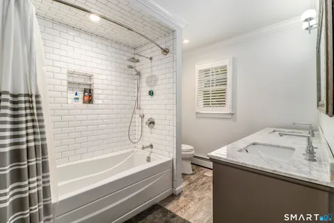 a bathroom with a sink and a bathtub