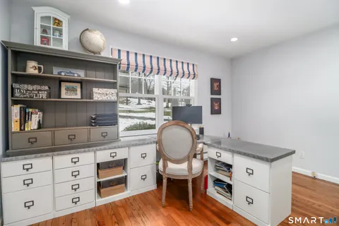 a room with a cabinets and a wooden floor
