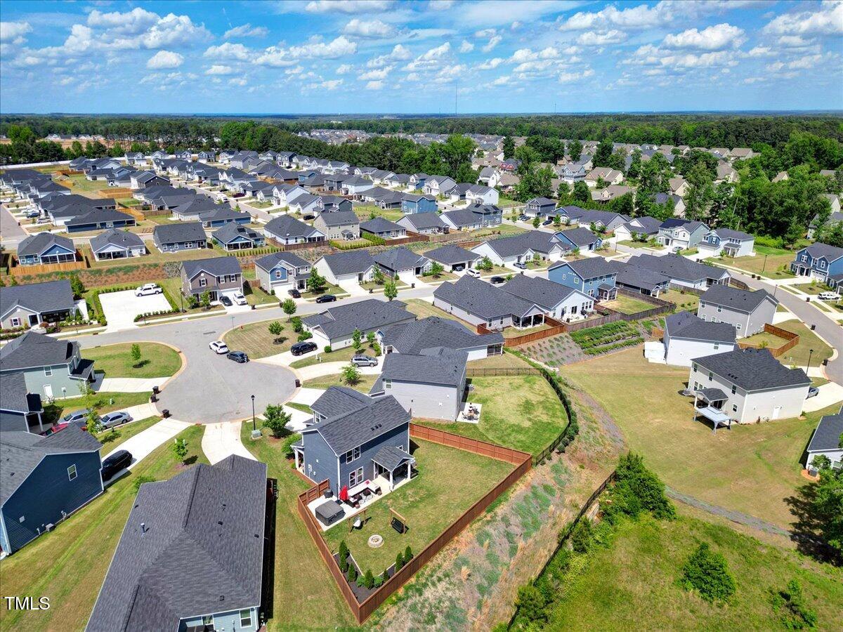 45 Iris Drive Youngsville, NC 27596 - Photo 26 of 35 an aerial view of residential houses with outdoor space