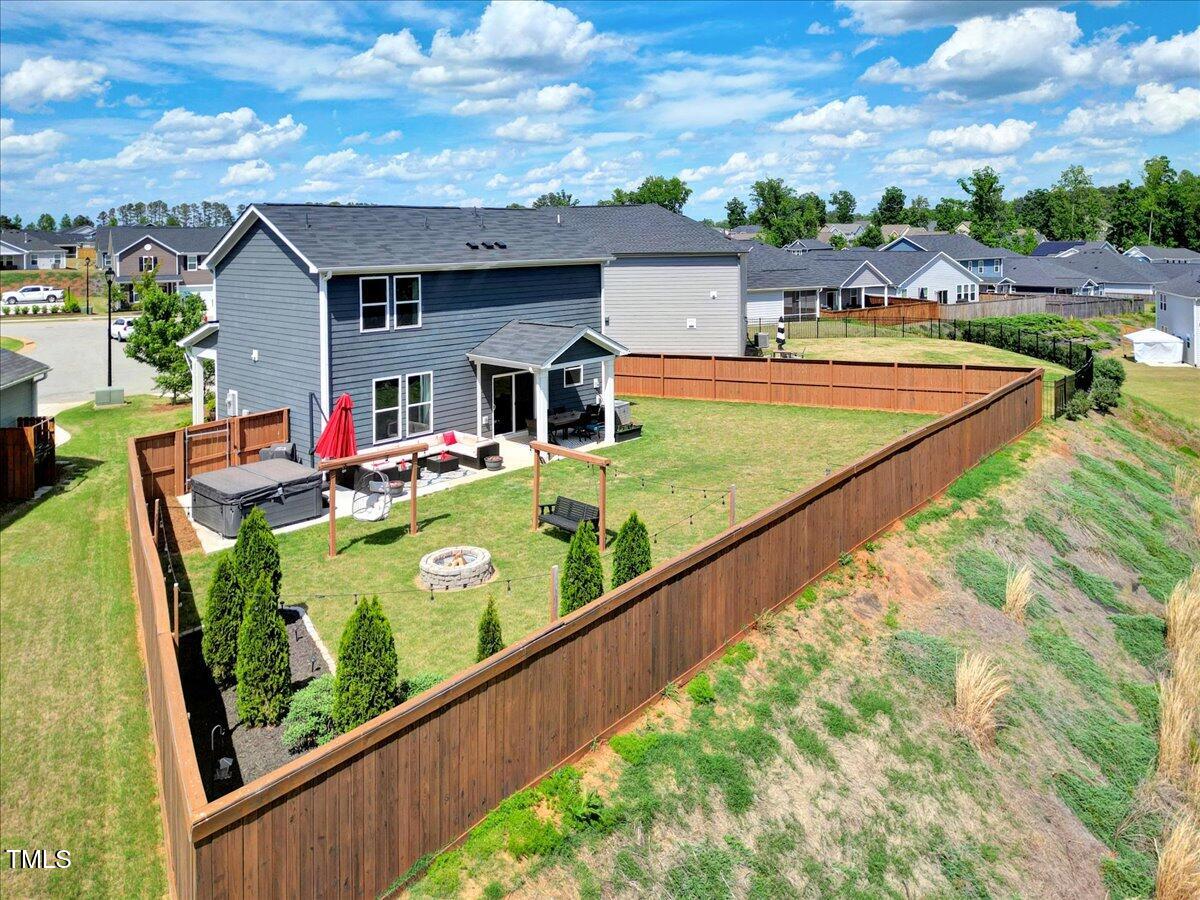 45 Iris Drive Youngsville, NC 27596 - Photo 27 of 35 a view of a house with pool and chairs