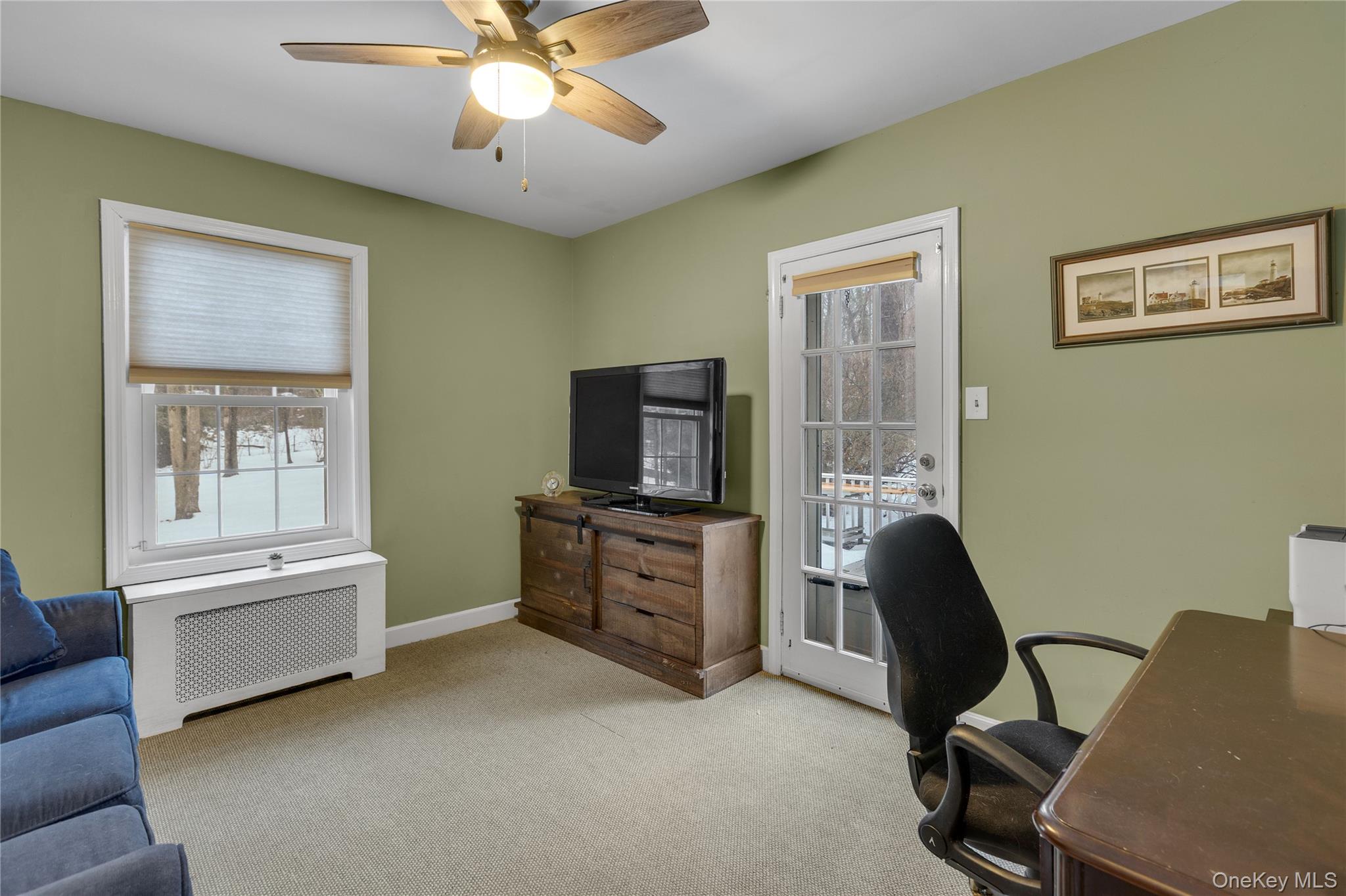 72 Daly Road East Northport, NY 11731 - Photo 6 of 18 a view of a workspace with furniture and a window