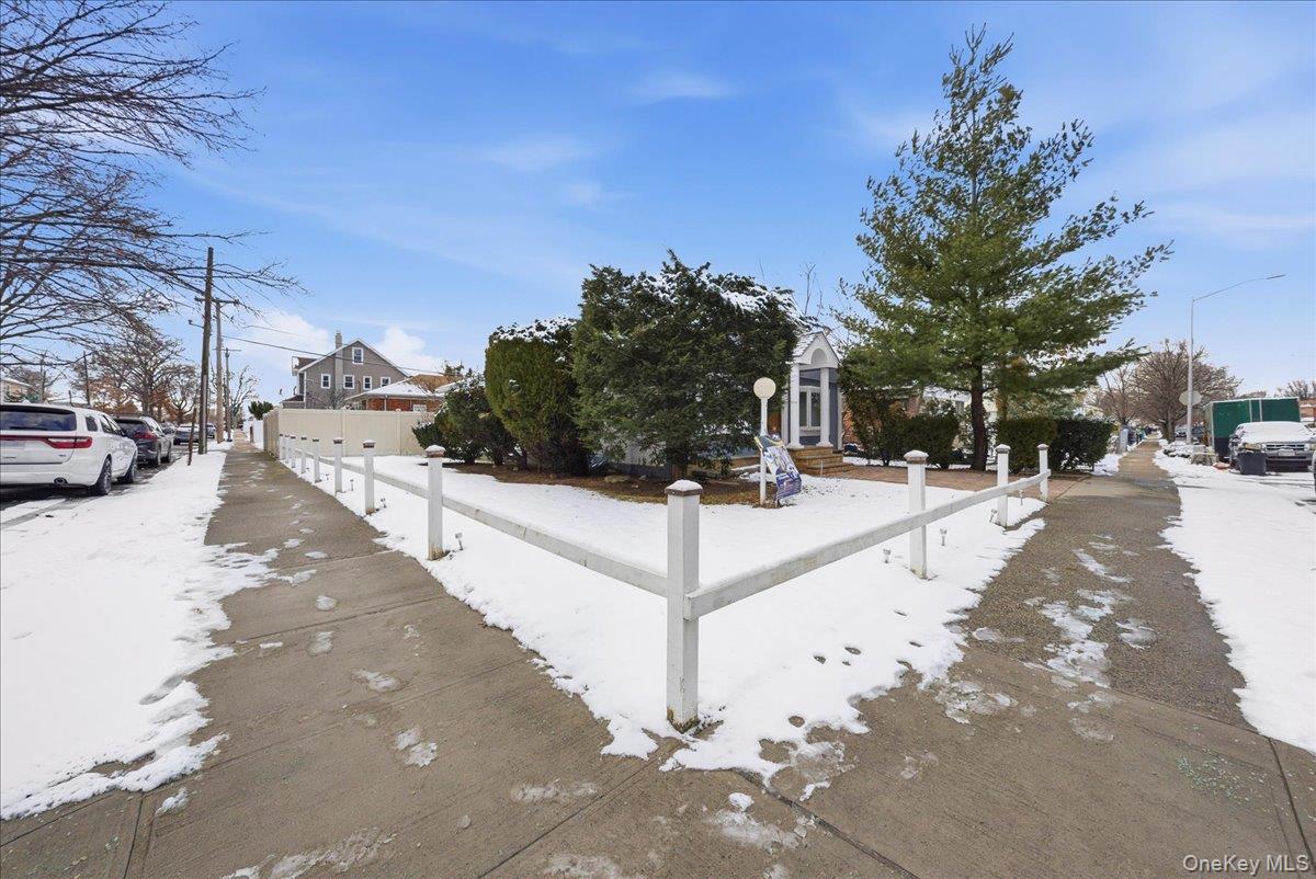 128-66 238th Street Queens, NY 11422 - Photo 25 of 25 a view of city street with tall trees