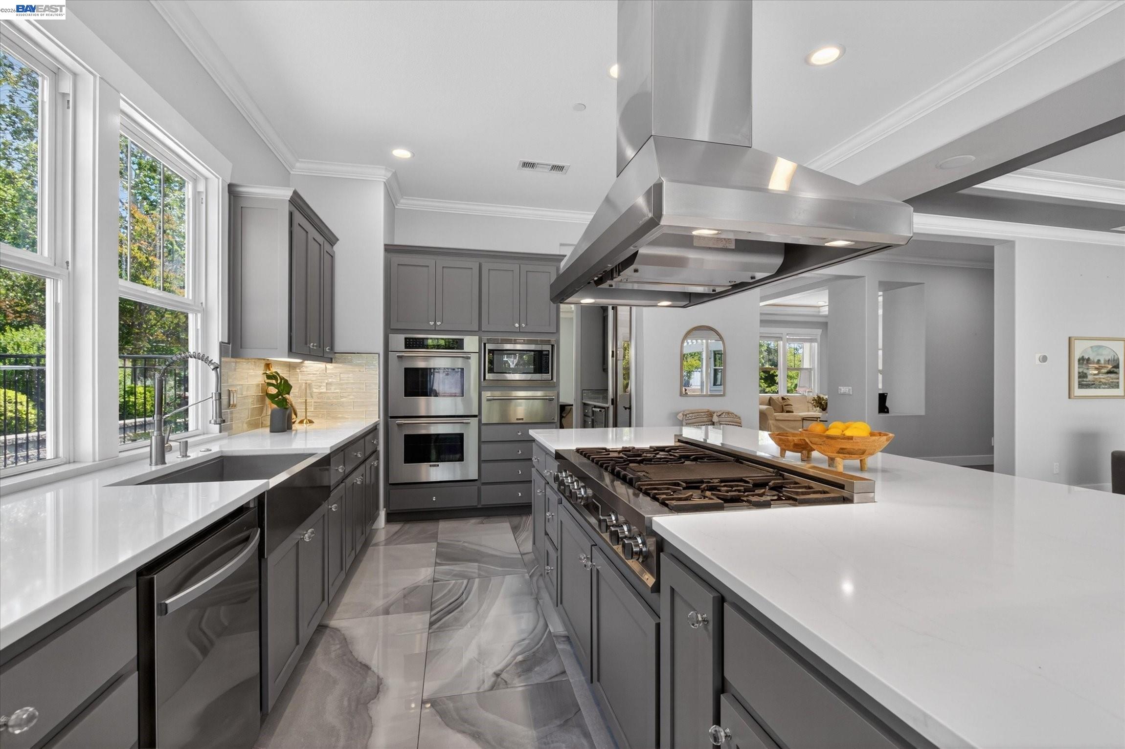 932 Hansen Road Livermore, CA 94550 - Photo 17 of 74 a kitchen with stainless steel appliances granite countertop a stove a sink and a refrigerator