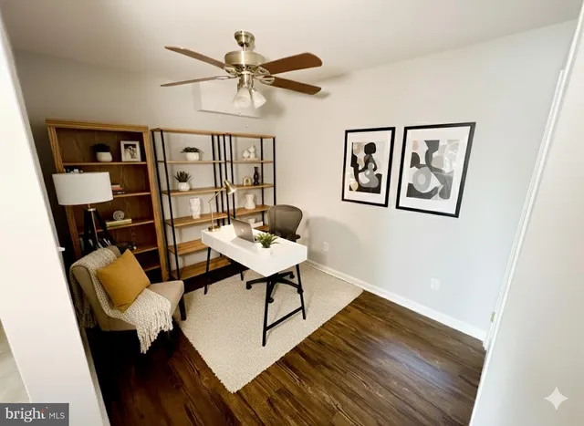 a workspace with furniture and window