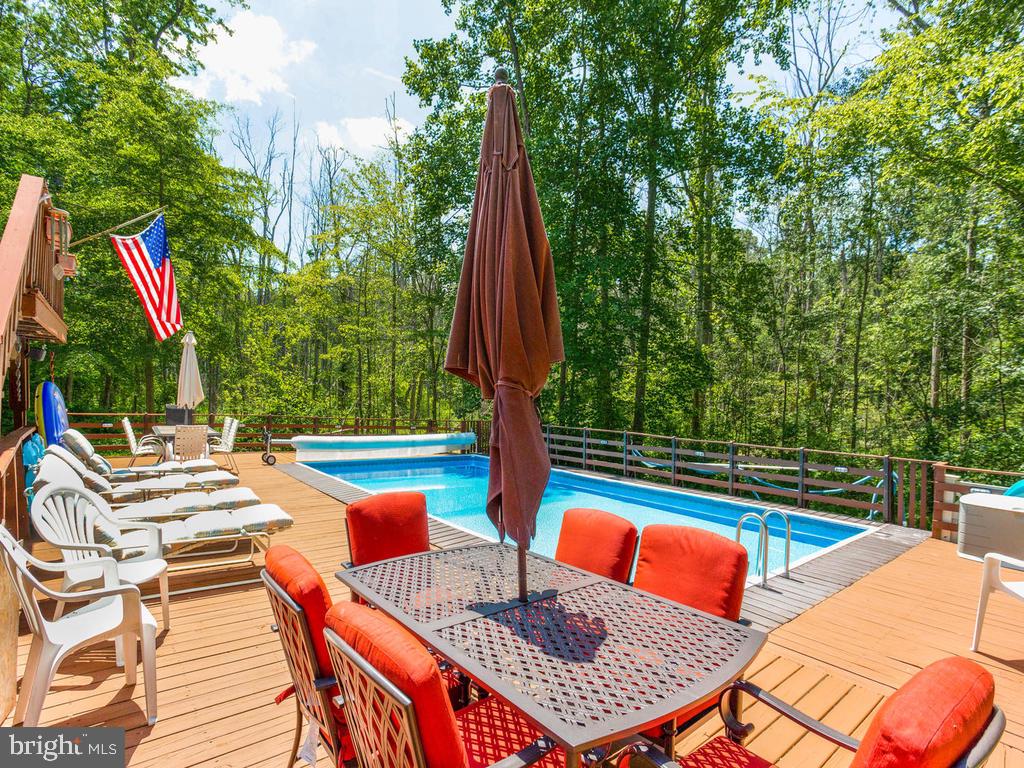 5040 Hardesty Road Sunderland, MD 20689 - Photo 35 of 44 Lots of deck around the pool