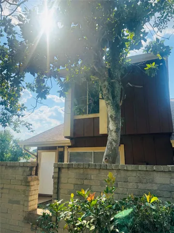 a view of swimming pool with a patio