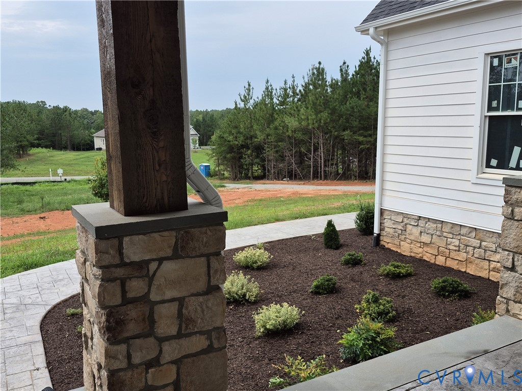 1554 Smokey Rdg Road Maidens, VA 23102 - Photo 2 of 14 Stamped concrete sidewalk and porch flooring